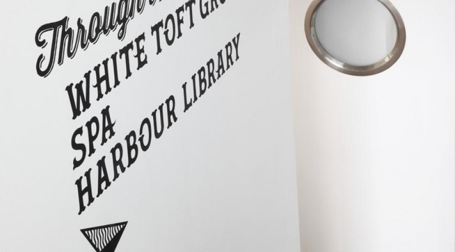 Signage within the Inn, in our unique 'whaletail' font